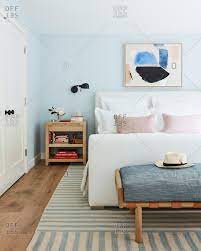 modern bedroom with light blue walls