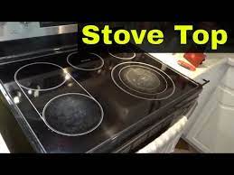 Cleaning A Glass Stove Top With Weiman