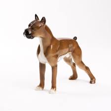 porcelain figurine of a boxer dog in