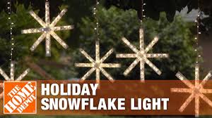 holiday snowflake light the home