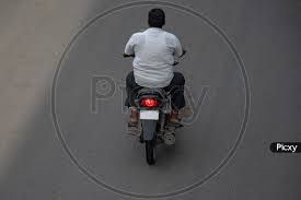 image of riding a motor bike without
