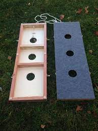 The teams split up and a member from the bottom of the game boards are lined with outdoor carpet. 11 3 Hole Washer Game Ideas Washers Game Backyard Games Yard Games