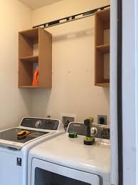 upper cabinets laundry room makeover