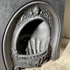 A Mid Victorian Cast Iron Fireplace
