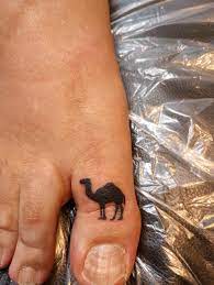 Camel toe tattoo