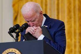 The image of President Biden bowing ...