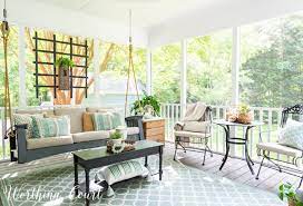 Cozy And Inviting Screened In Porch