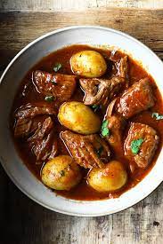 hearty beef and potato stew serving