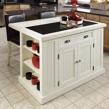 With a drop leaf, this kitchen cart can also be used as a breakfast bar, so you can eat anywhere just by moving the kitchen cart. Kitchen Islands Carts At Lowes Com