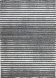 dark gray rug with white stripes