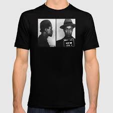 Check out our malcolm x shirt selection for the very best in unique or custom, handmade pieces from our clothing there are 2228 malcolm x shirt for sale on etsy, and they cost $19.52 on average. Malcolm X Mugshot T Shirt By Allsurfacesdesign Society6