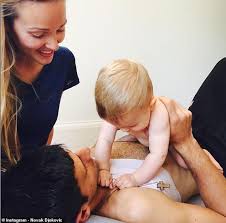 Tennis player and jelena ristic got married in july. Novak Djokovic Goes Baby Car Seat Shopping With Rackets Still On His Back Daily Mail Online