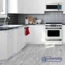 Vinyl flooring is a trendy type of floor, especially in the kitchen. Kitchens Vinyl Flooring Installation Uae Carpets