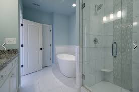 If you want to interchange. Houzz Same Large Tile On Shower Wall And Bathroom Floor Tile Strips Placed Vertically On Shower Feature Wall Hexi Houzz Bathroom Bathroom Flooring Bathroom