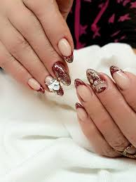 highly attractive maroon colored nail art design for pointed nails
