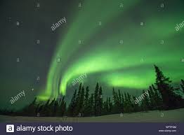 Northern Lights Aurora Borealis Glowing Brightly Over