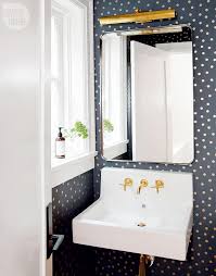 Powder Room With Black And Gold Polka