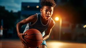 young basketball player training
