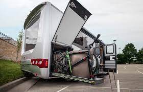 leisure motorhome pushes cyclists