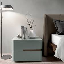A wide range of prices, styles and finishes. Curved Bedside Table