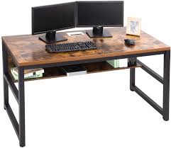 The wooden desktop has a natural finish, and sits atop a brass base with four slim, slightly splayed legs. Amazon Com Topsky 55 Computer Desk With Bookshelf Metal Desk Grommet Hole Wire Cover Rustic Brown Office Products