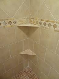 It's fresh, inexpensive and classic. Our Own Ceramic Shower Wall And Floor Tile Border Detail And Shelves Of Travertine Tile Floor Bathroom Wall Tile Tile Bathroom