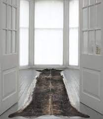 long stretched faux cowhide rug from