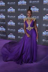 african royalty on the purple carpet at