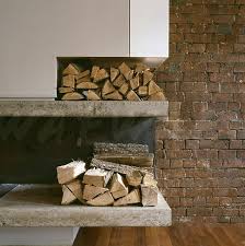 Logs D Above Modern Fireplace