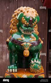 Shiisa, or Okinawan lion gods, are protective deities said to bring good  luck. Here one is on display at Okinawa World Stock Photo - Alamy