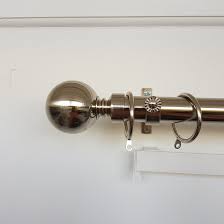 guide how to put up a curtain pole