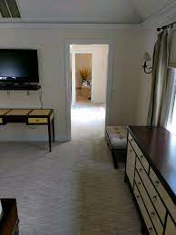 patterned wall to wall carpet is