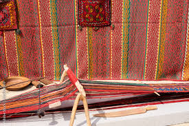 weaving machine for carpet weaving