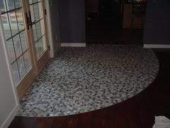 curved transition from carpet to tile