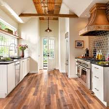 Laminate kitchen floors durable laminate flooring is an inexpensive option available in styles that mimic hardwood and stone. The Top 10 Flooring Trends For 2019 Cheap Kitchen Floor Kitchen Flooring Best Flooring For Kitchen