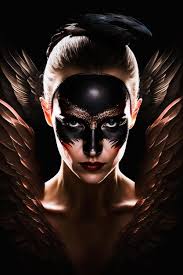 black wings and a black feathered face