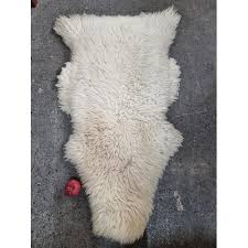 a genuine sheepskin rug made in