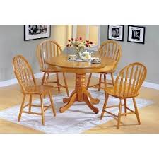 Kitchen tables typically hold four to eight guests, and dining room tables hold anywhere from six to 12, often with leaves inside that can extend that number. Country Kitchen Tables And Chairs Home Furniture Furnishings