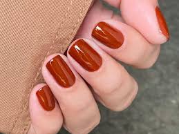 burnt orange nails are having a moment