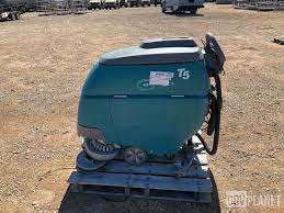 surplus tennant t5 floor scrubber in