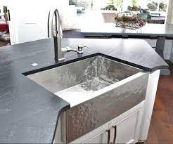It doesn't seem like the kind of place bacteria would like to grow in (especially if you're cleaning it with soap and water on a regular basis). Hammered Stainless Steel Farmhouse Undermount Sink Kitchen Orlando By Havens Luxury Metals