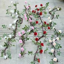 While a single flower wall is attractive, some decorators choose to mix flower panels with other types of decorations such as ferns or grass. Fake Rose Flower Vine Garland Silk Flowers Wall Decor Garlands Artificial Rose Vines Home Outdoor Wedding Arch Floral Decoration Country Wedding Decorations