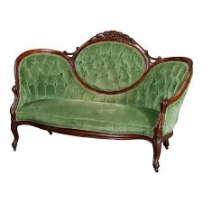 This couch offers a modern take on a timeless classic with its rounded tufted arms and nailhead trim. Antique Victorian Carved Walnut And Velvet Medallion Back Sofa Circa 1890 For Sale At 1stdibs