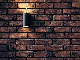 how to light a brick wall