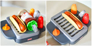 The magic serving tray brings the role play to life for kids when it recognizes the food they're serving with songs and different phrases like who wants pizza? or mmmm, cookies! there are also songs to teach kids about. Fisher Price Servin Surprises Kitchen Table Living Well Mom