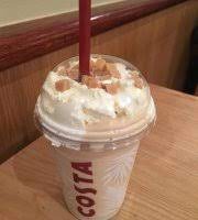 having a creamy cooler at costa coffee