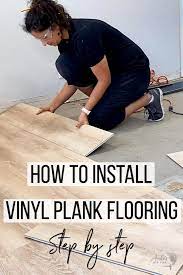 Start laying the flooring along one wall, working row by row. Installing Vinyl Plank Flooring For Beginners Anika S Diy Life
