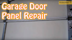 damaged garage door panel