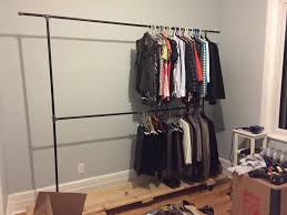 This garment rack with a mesh shelf provides a convenient closet solution for small spaces. Black Iron Pipe Garment Rack 5 Steps With Pictures Instructables