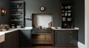 In this type of modular kitchen design, storage is reserved for upper and lower cabinets, while leave enough counter space for cooking purposes. 12 Black Kitchen Ideas That Will Make You Want To Go Over To The Dark Side Real Homes